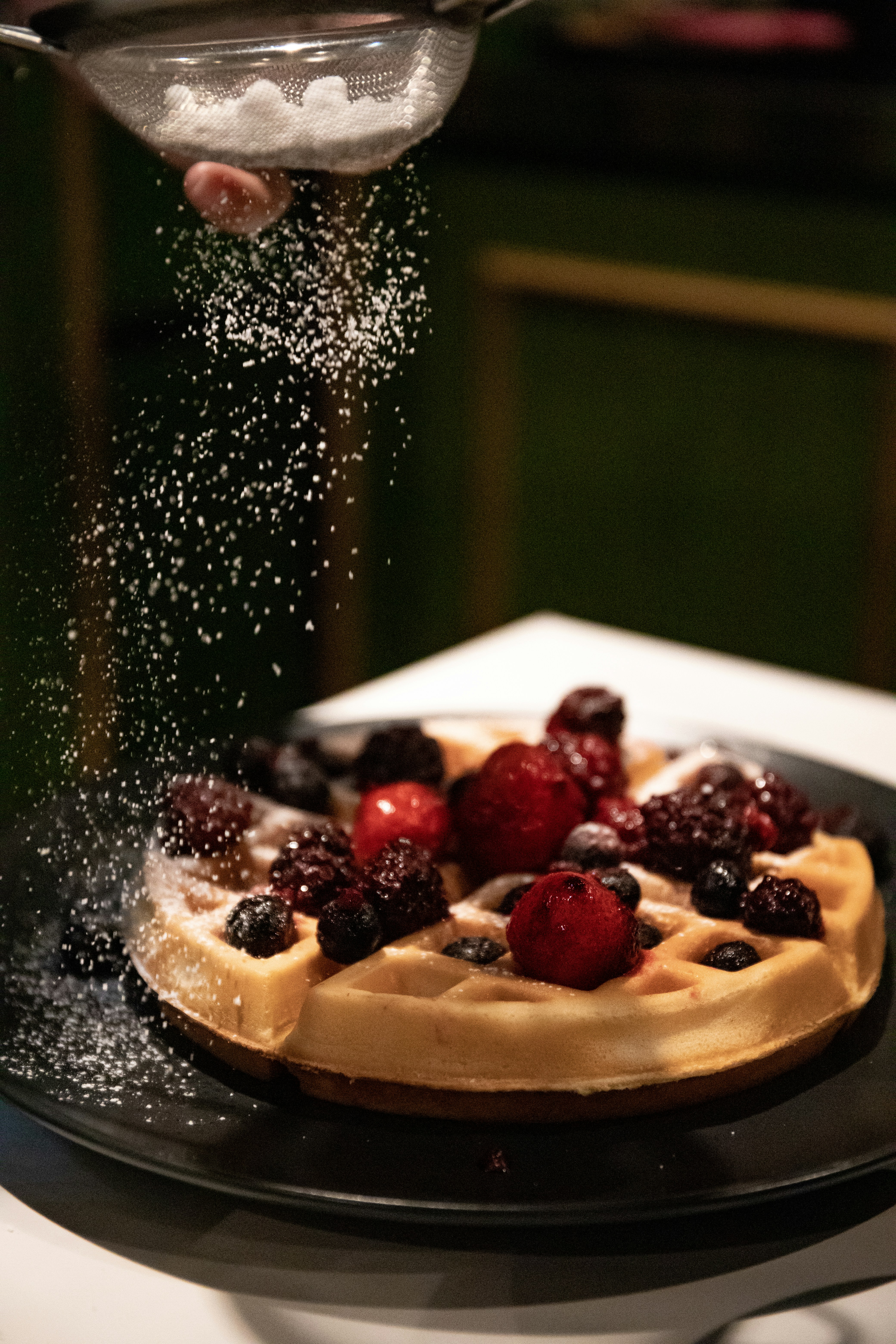 sliced strawberry on white ceramic plate