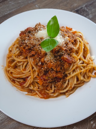 spaghetti on white ceramic plate