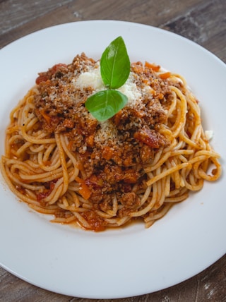 spaghetti on white ceramic plate