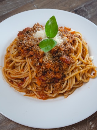 spaghetti on white ceramic plate