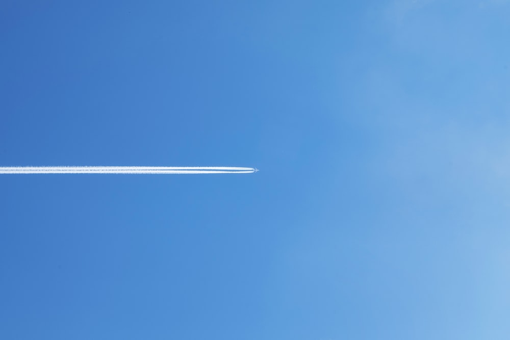 white plane in the sky