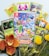 A collection of Pokémon trading cards and a Nintendo Switch game case titled 'New Pokémon Snap.' The cards feature various Pokémon characters surrounded by tropical foliage, colorful flowers, and small ornamental plants.