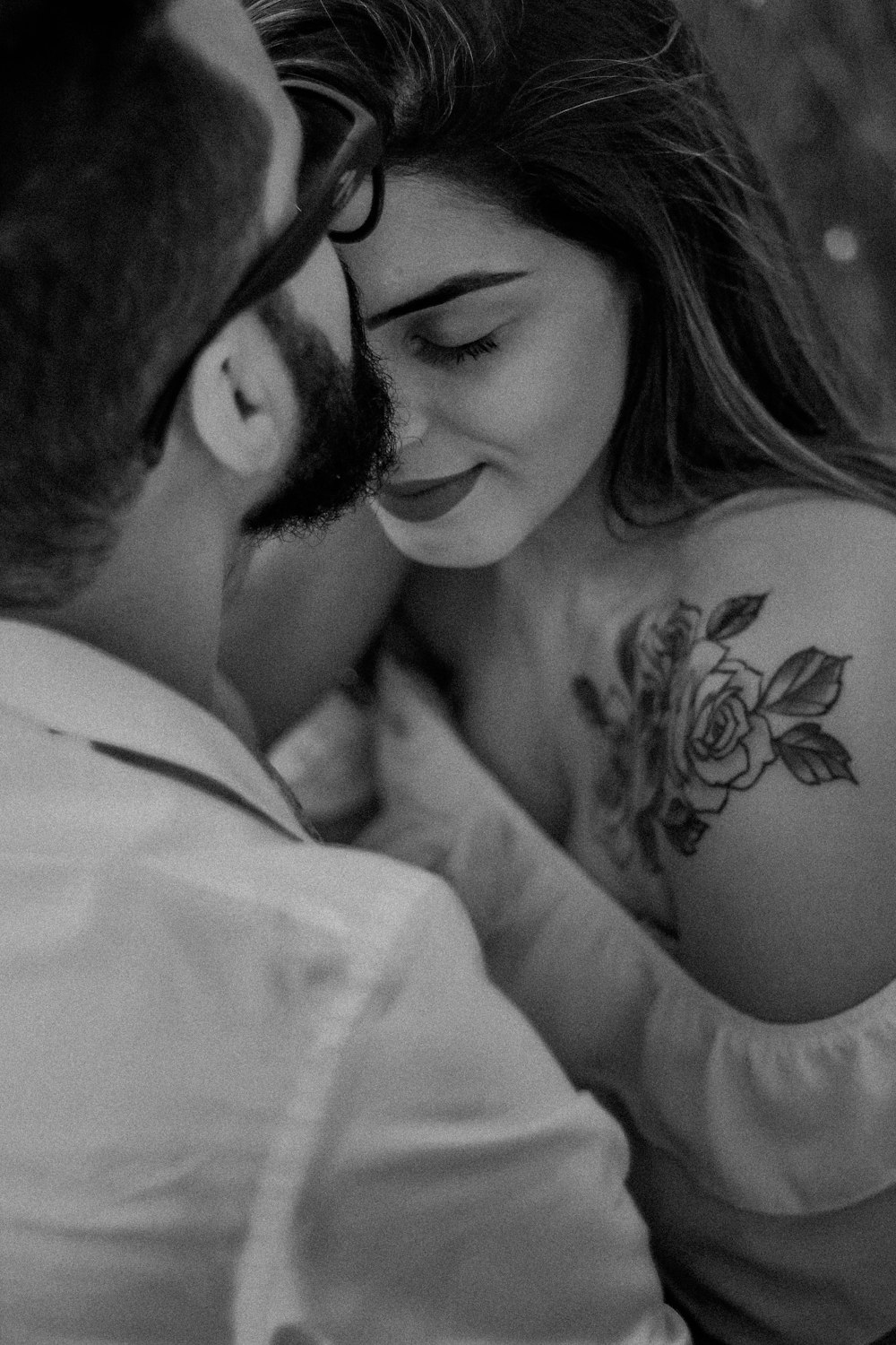 woman with black floral tattoo on her back