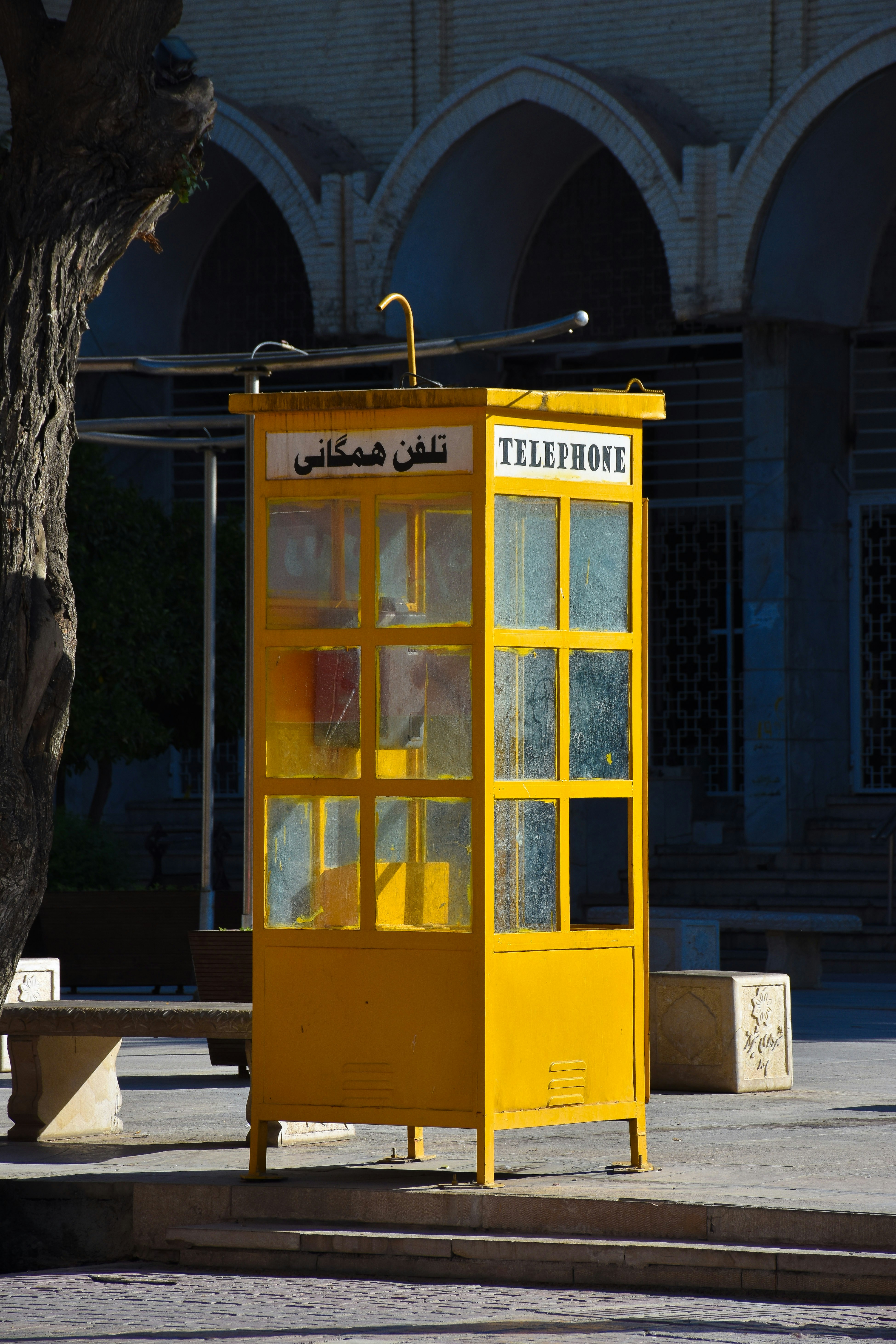 yellow and blue wooden framed glass window