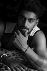 Monochrome portrait tattoo showing subtle shading and expression.