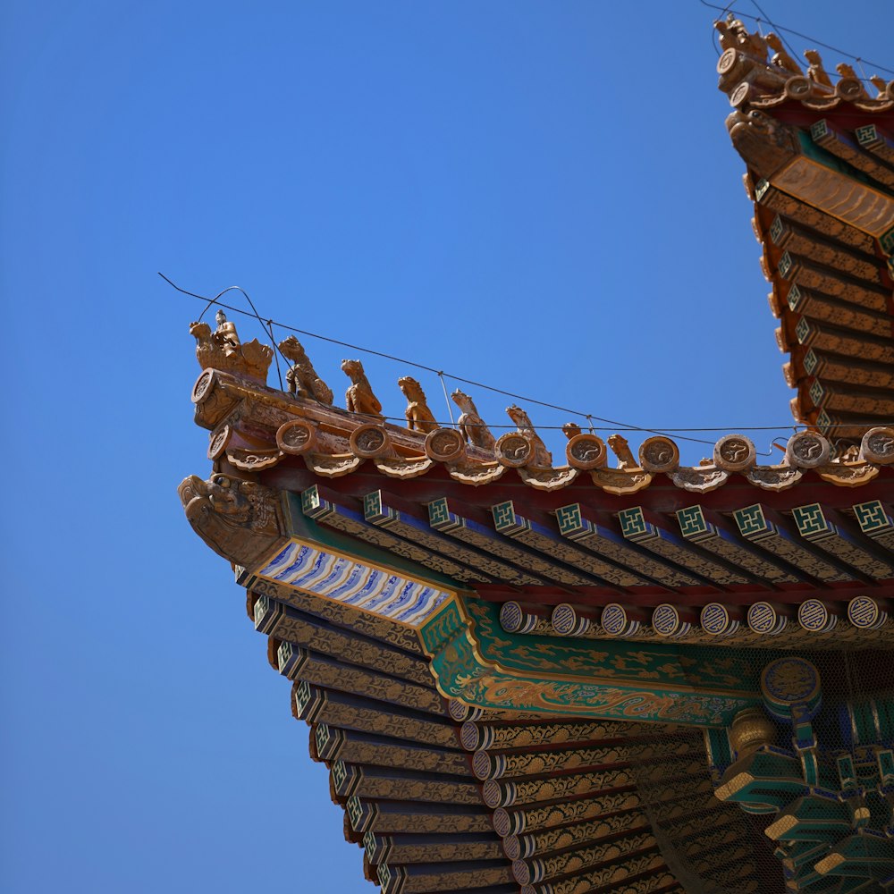 brown roof under blue sky during daytime