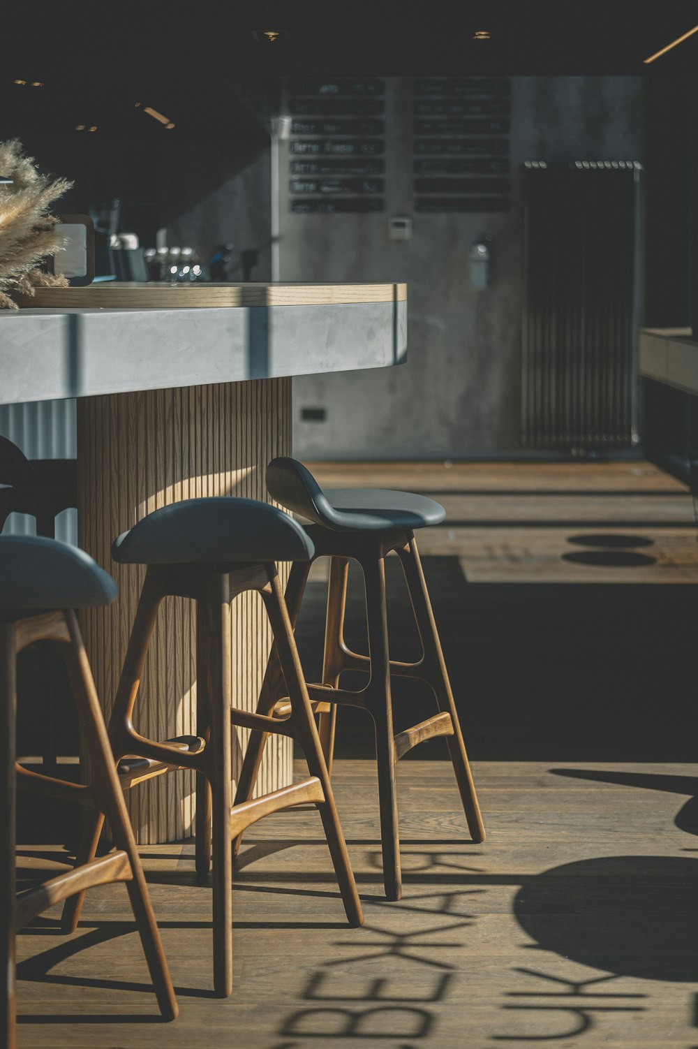 black and brown wooden bar stools