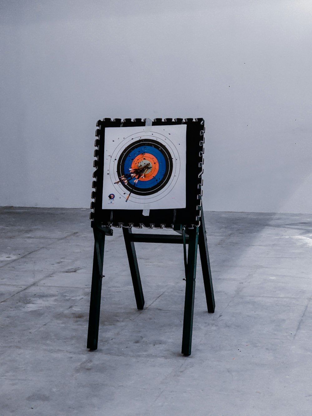 black wooden chair on white floor tiles