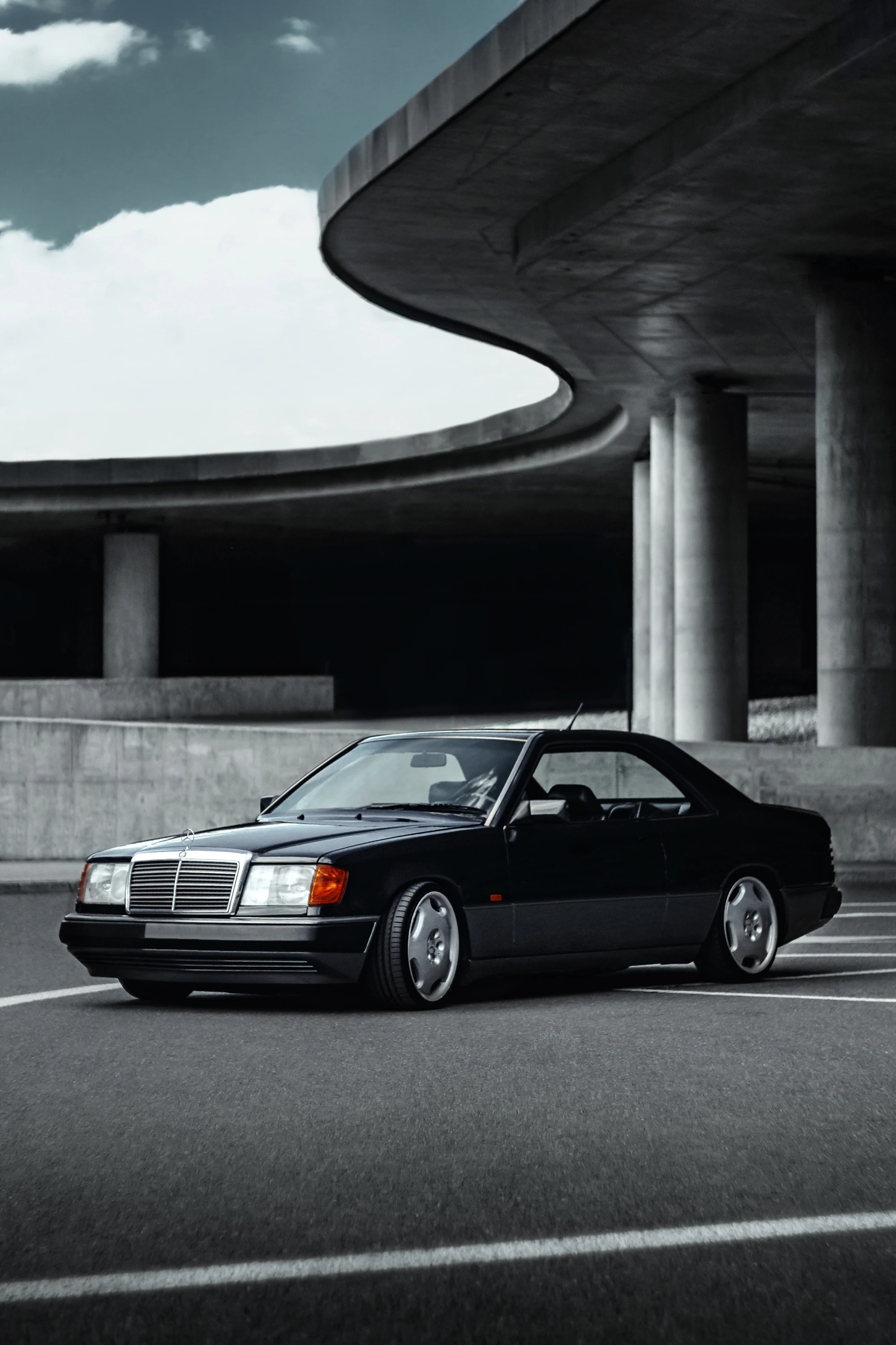 Classic Mercedes coupe at night