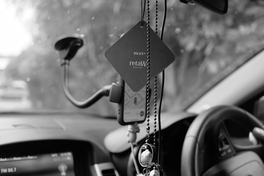 grayscale photo of car key