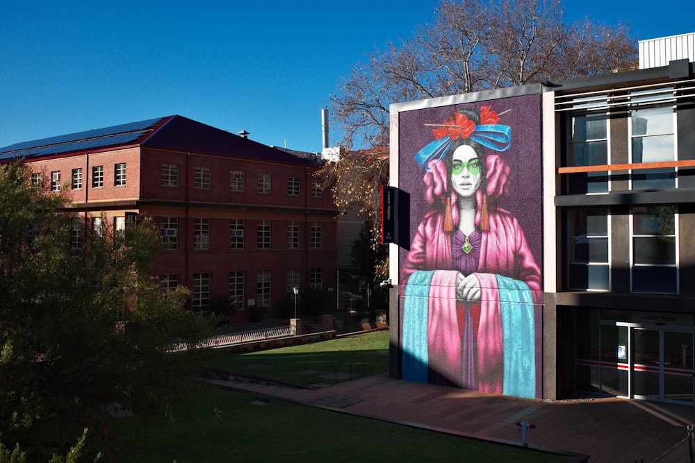 woman in purple dress statue