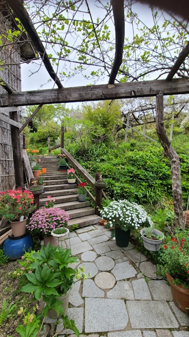 A charming garden pathway leading to a wedding altar.
