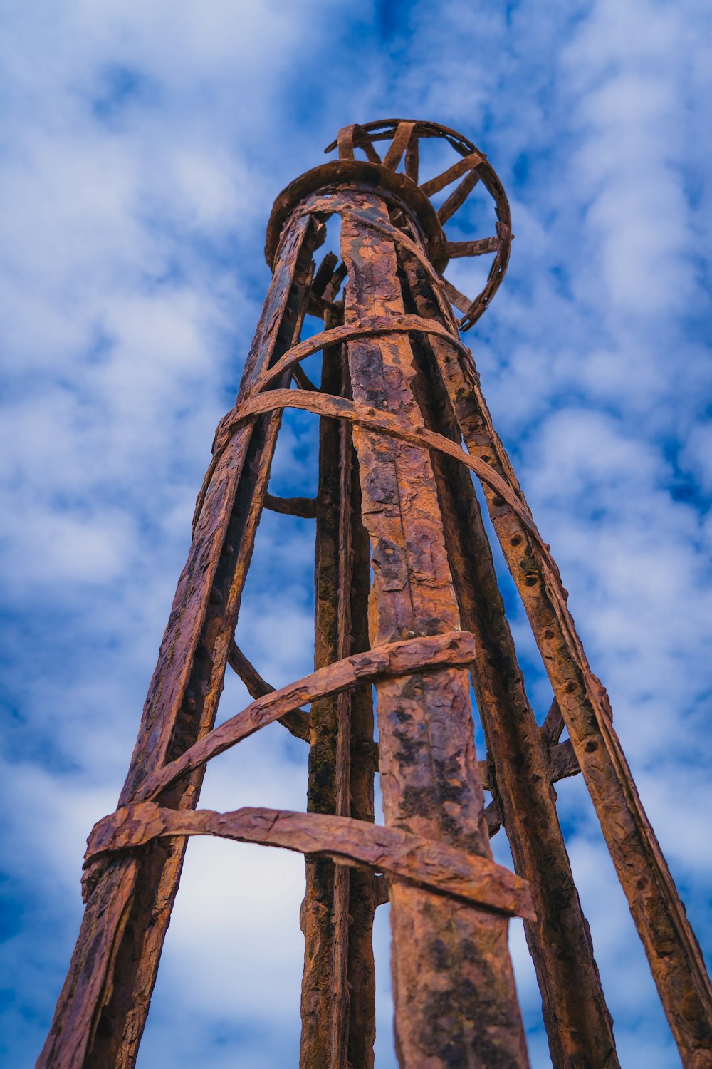 brown wooden tower under blue sky