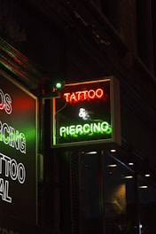 red and white UNKs coffee neon signage