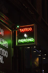 red and white UNKs coffee neon signage