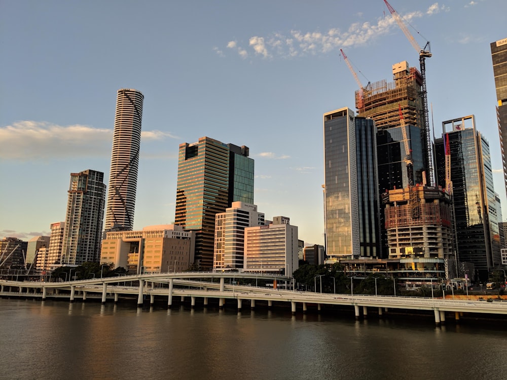 high rise buildings near body of water during daytime