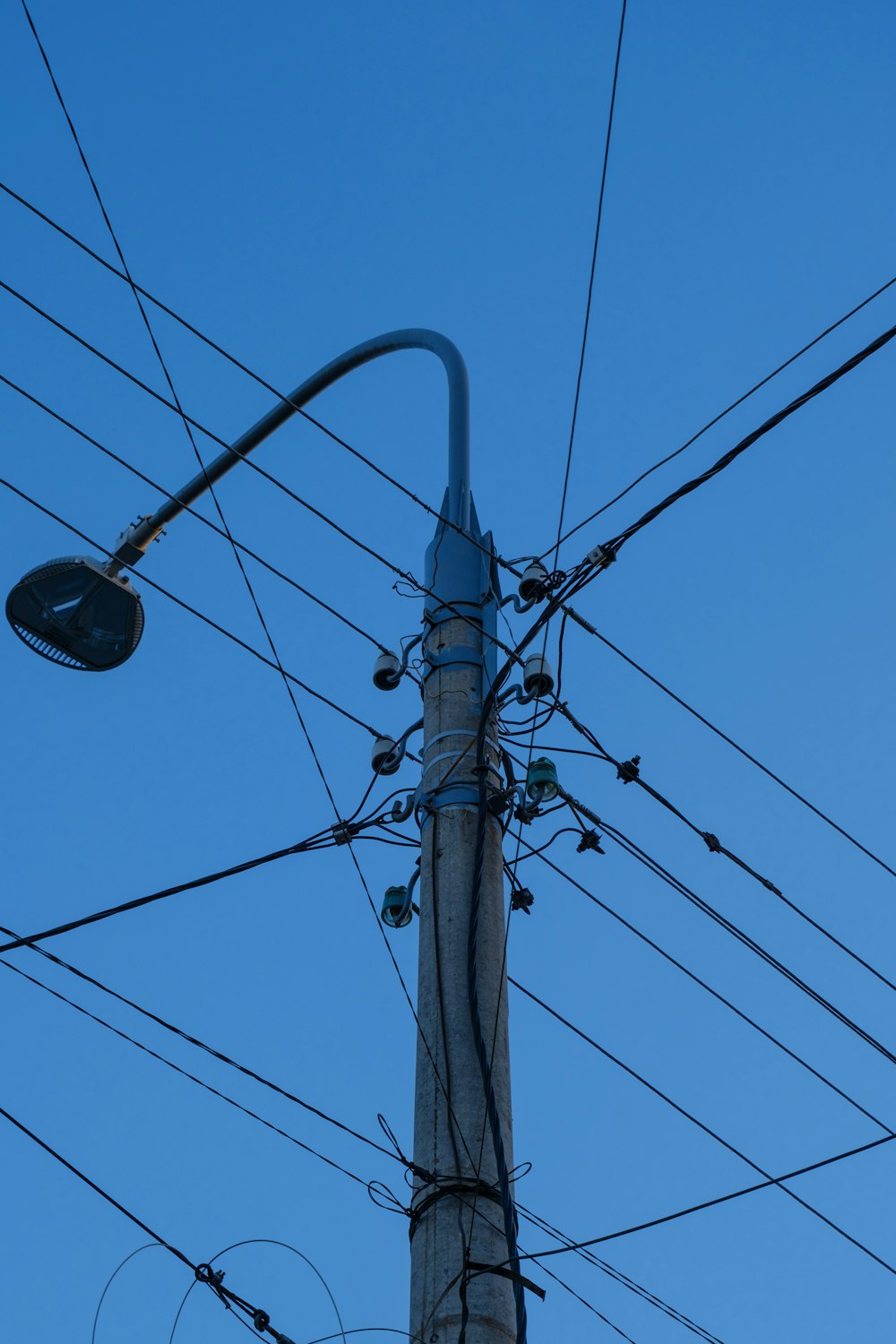 black street light under blue sky during daytime