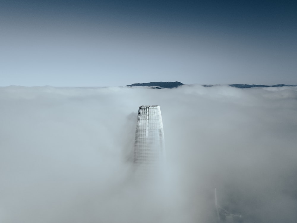 high rise building covered with fog