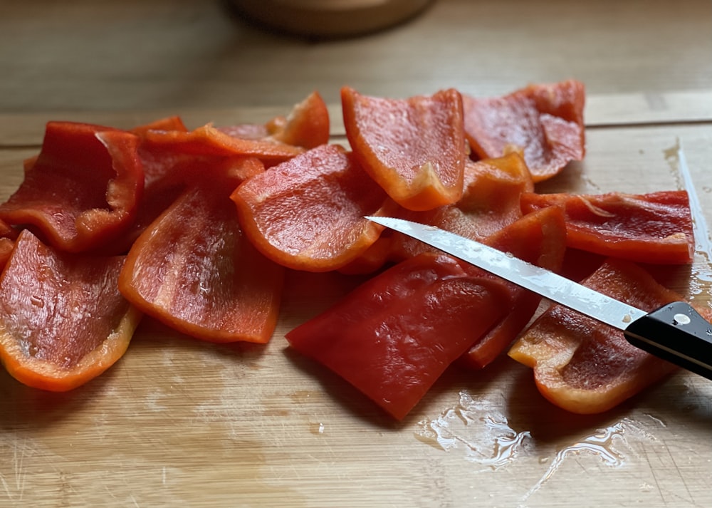 sliced watermelon on brown wooden table