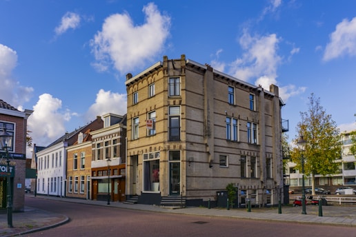 brown concrete building under blue sky during daytime