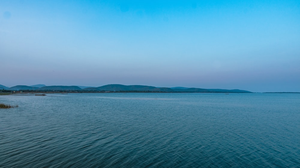 blue sea under blue sky during daytime