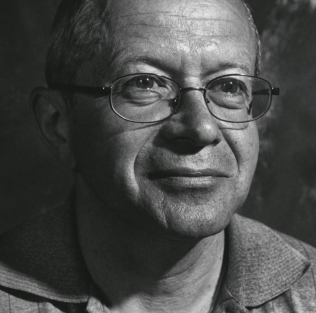 man in black framed eyeglasses