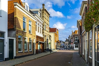 brown and white concrete building during daytime