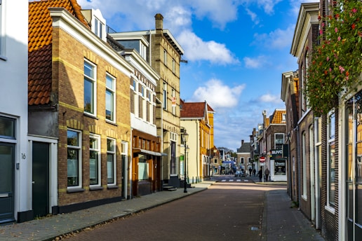 brown and white concrete building during daytime