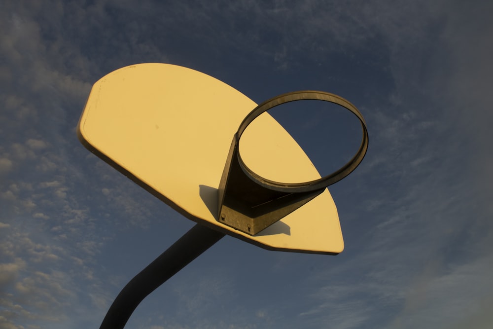 a close up of a satellite dish with a sky background