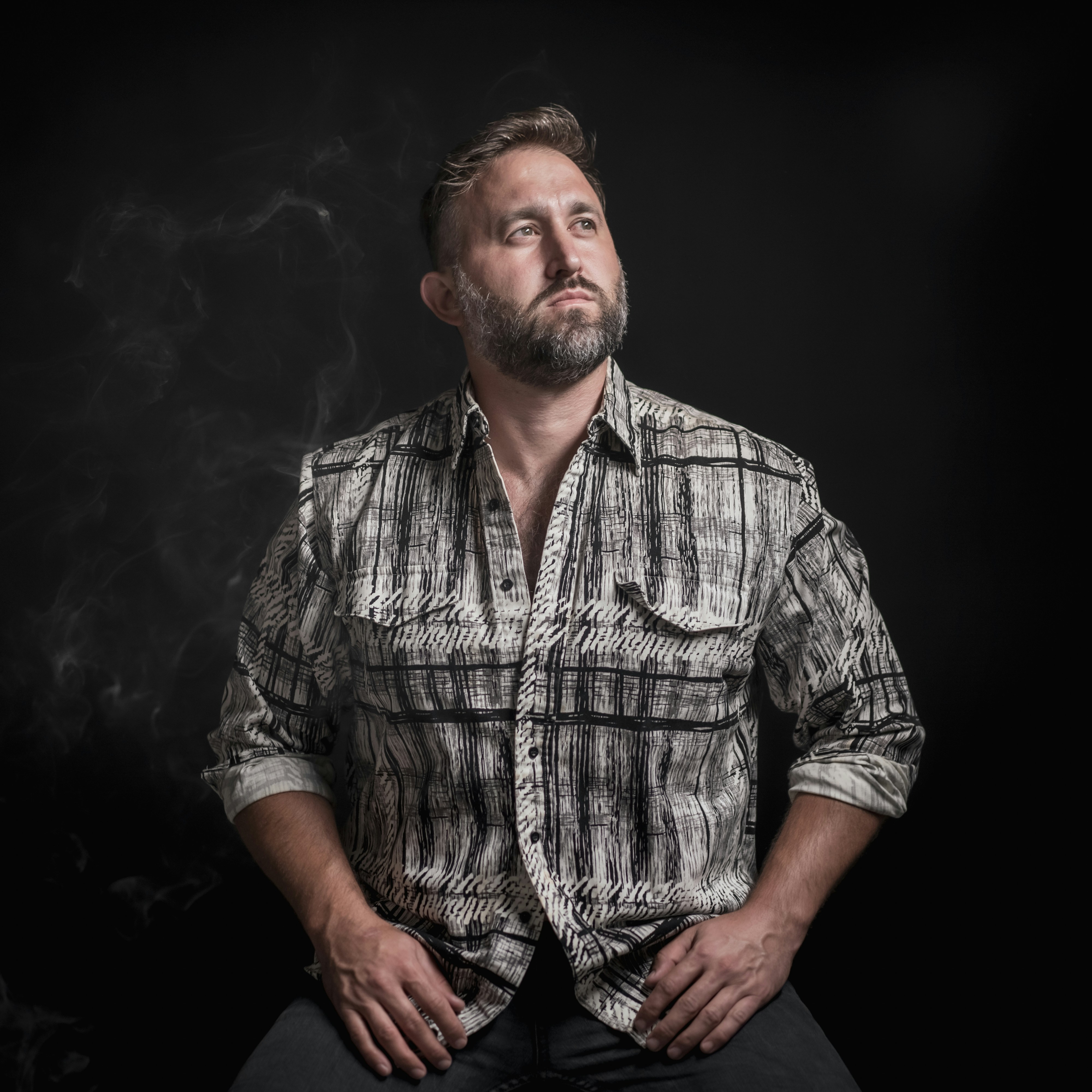 man in brown and white button up shirt