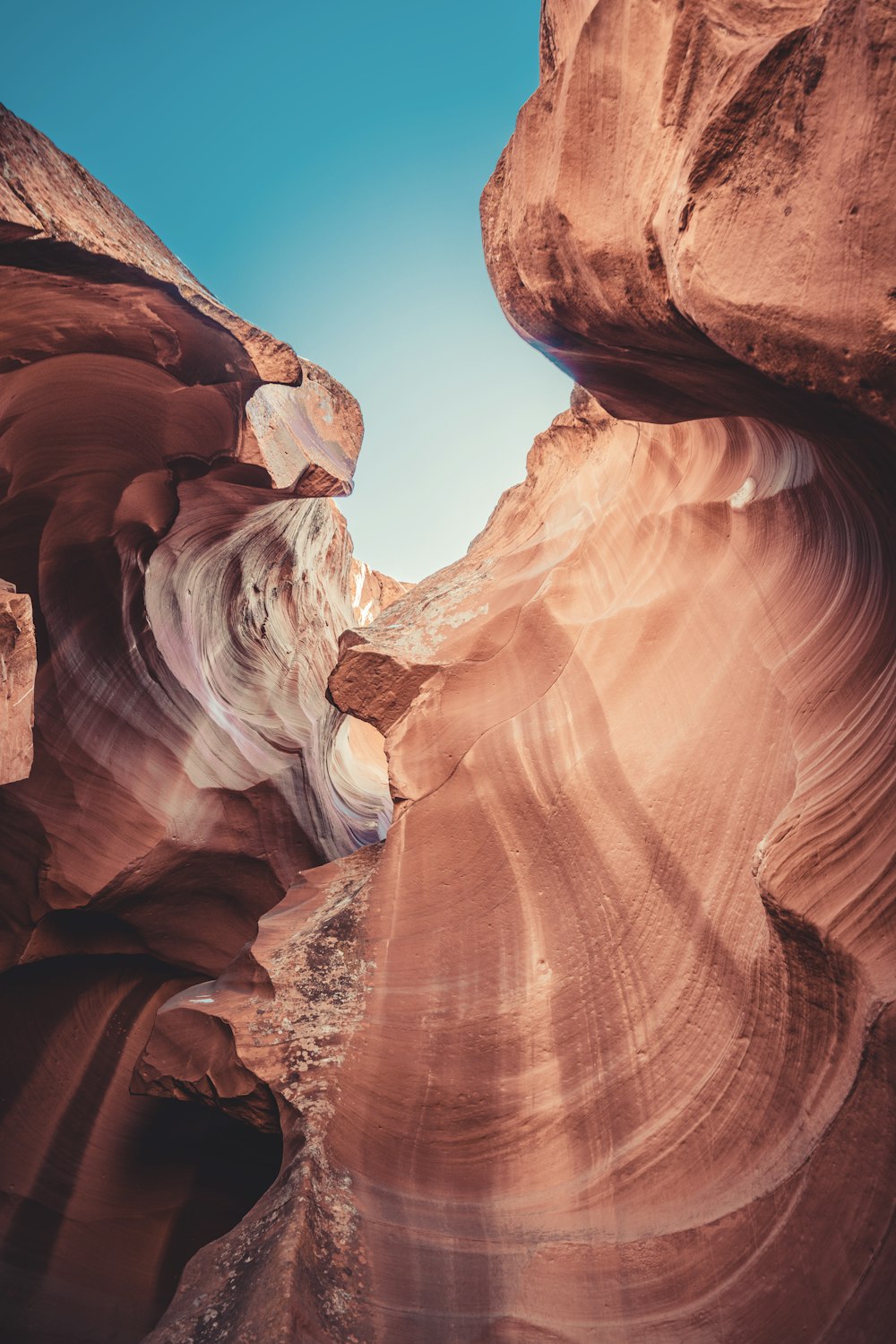 brown rock formation under blue sky during daytime