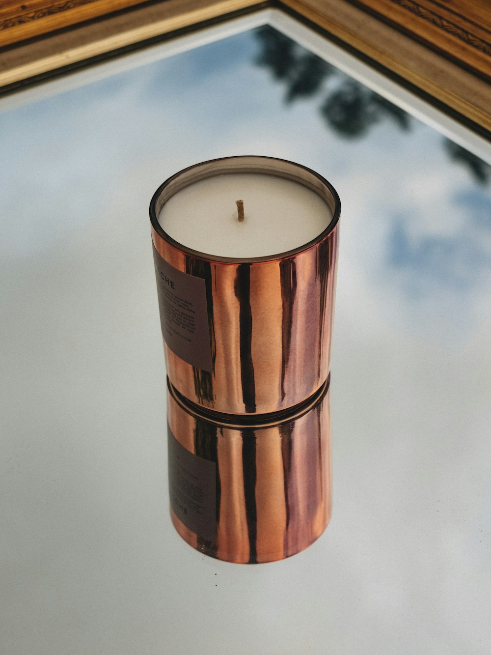 brown and white pillar candle