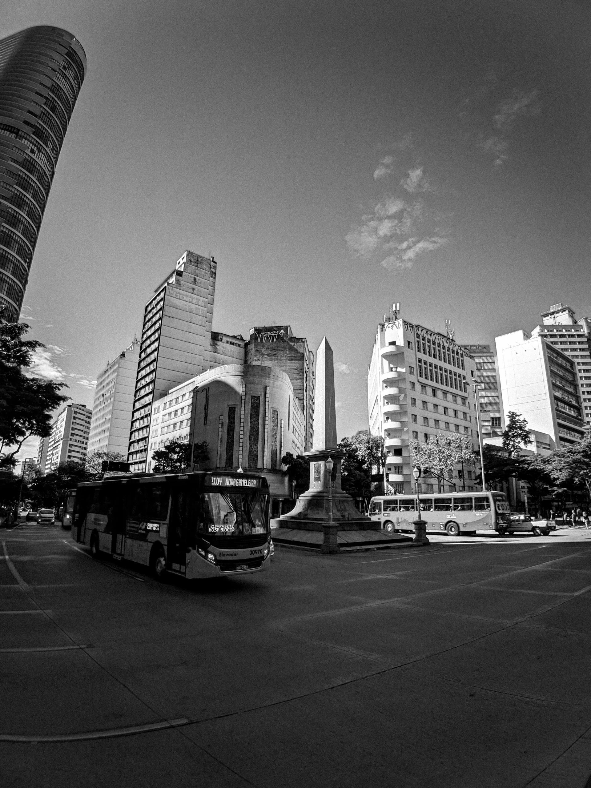grayscale photo of city buildings