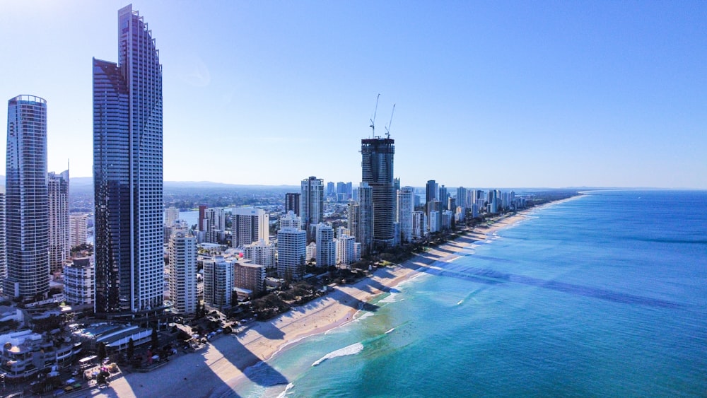 high rise buildings near sea during daytime