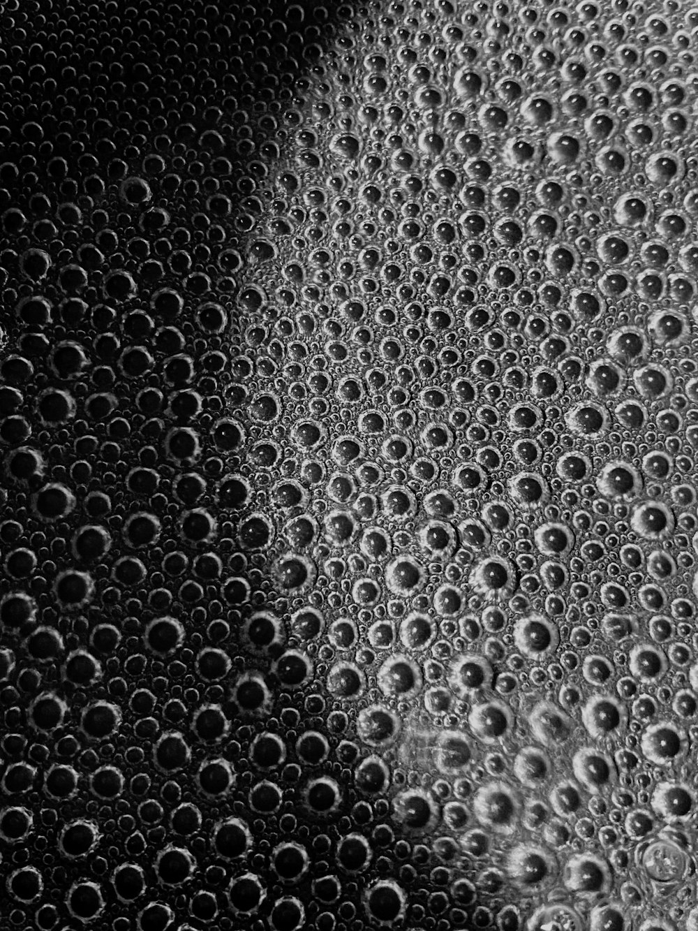 water droplets on black surface