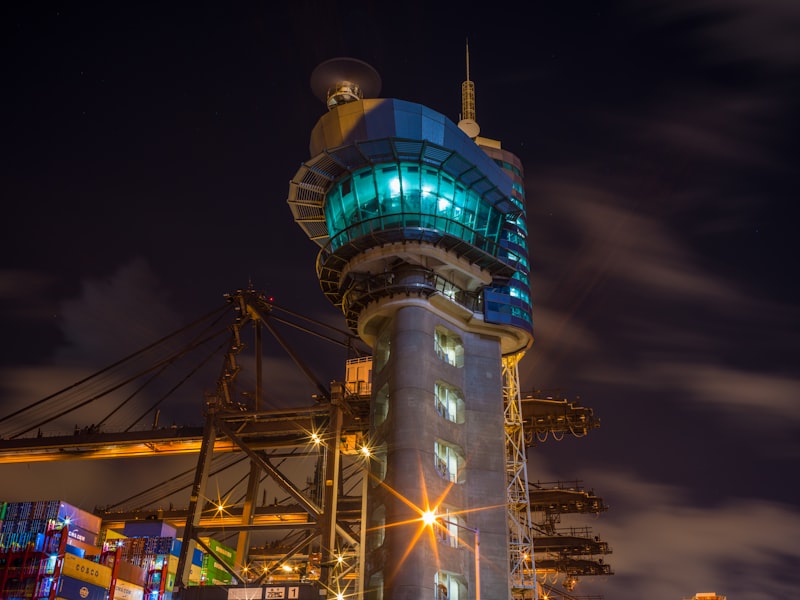 blue and white tower during night time