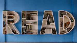 the letters read read are made out of bookshelves