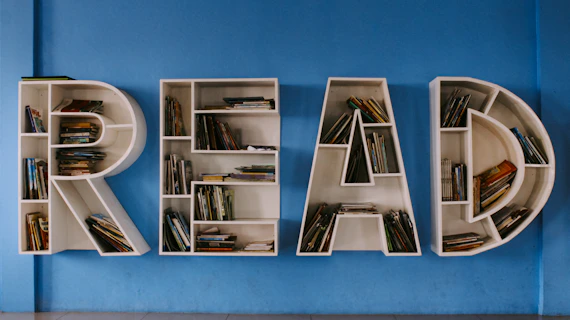 the letters read read are made out of bookshelves