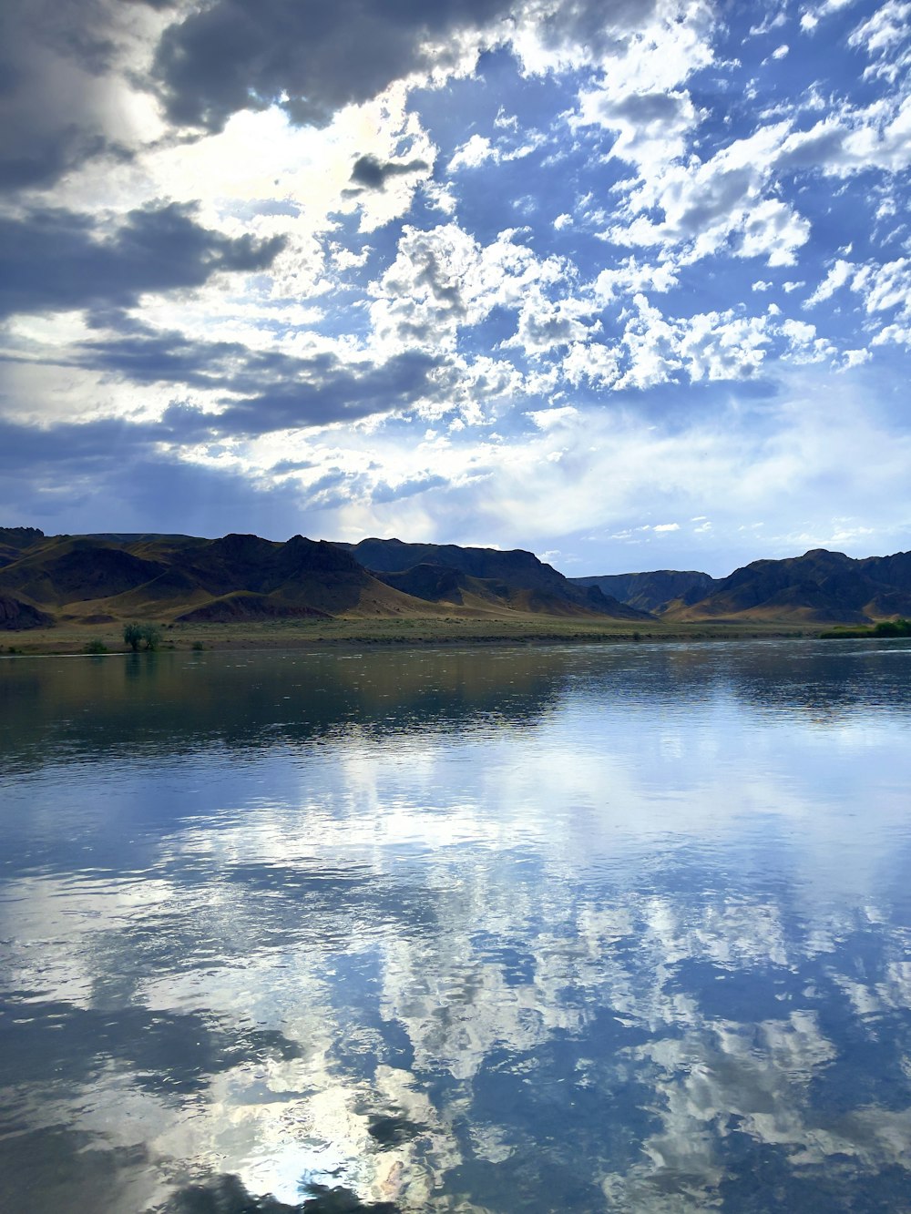 a large body of water surrounded by mountains