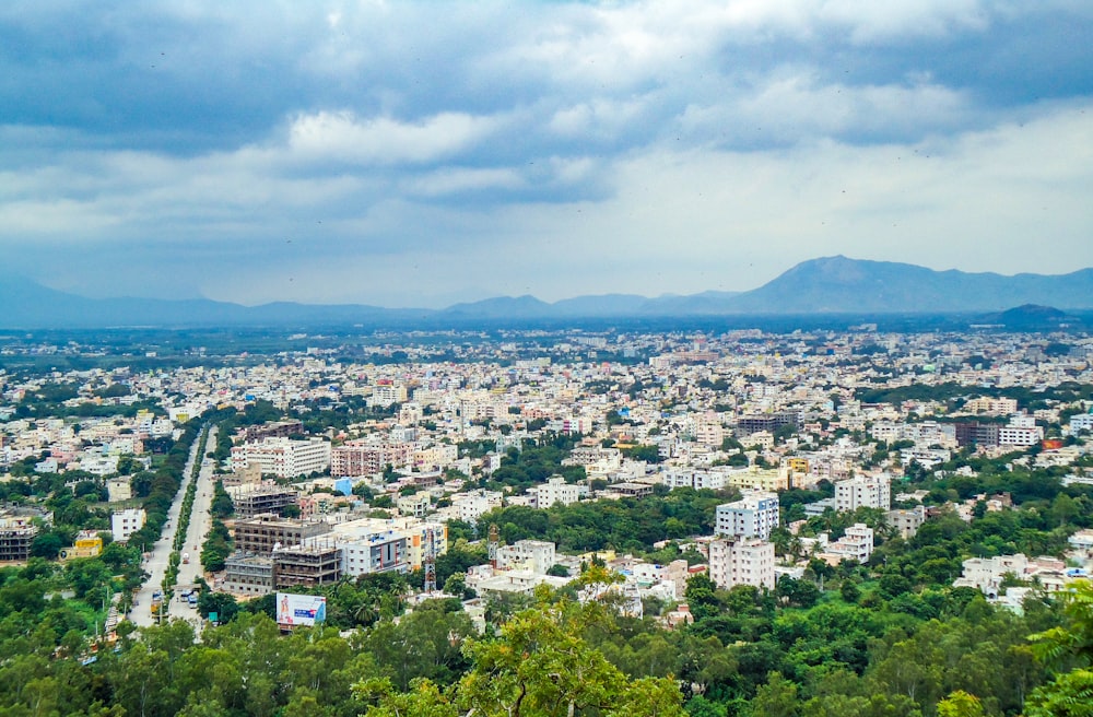 a view of a city from the top of a hill