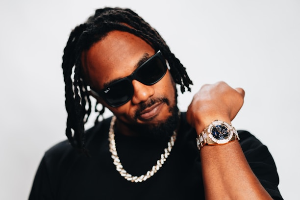 a man with a watch on his wrist
