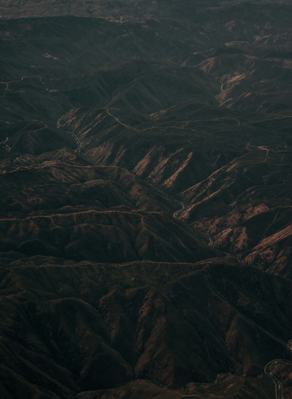 brown and black mountains during daytime