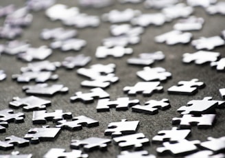 a close up of a bunch of puzzle pieces