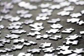 a close up of a bunch of puzzle pieces