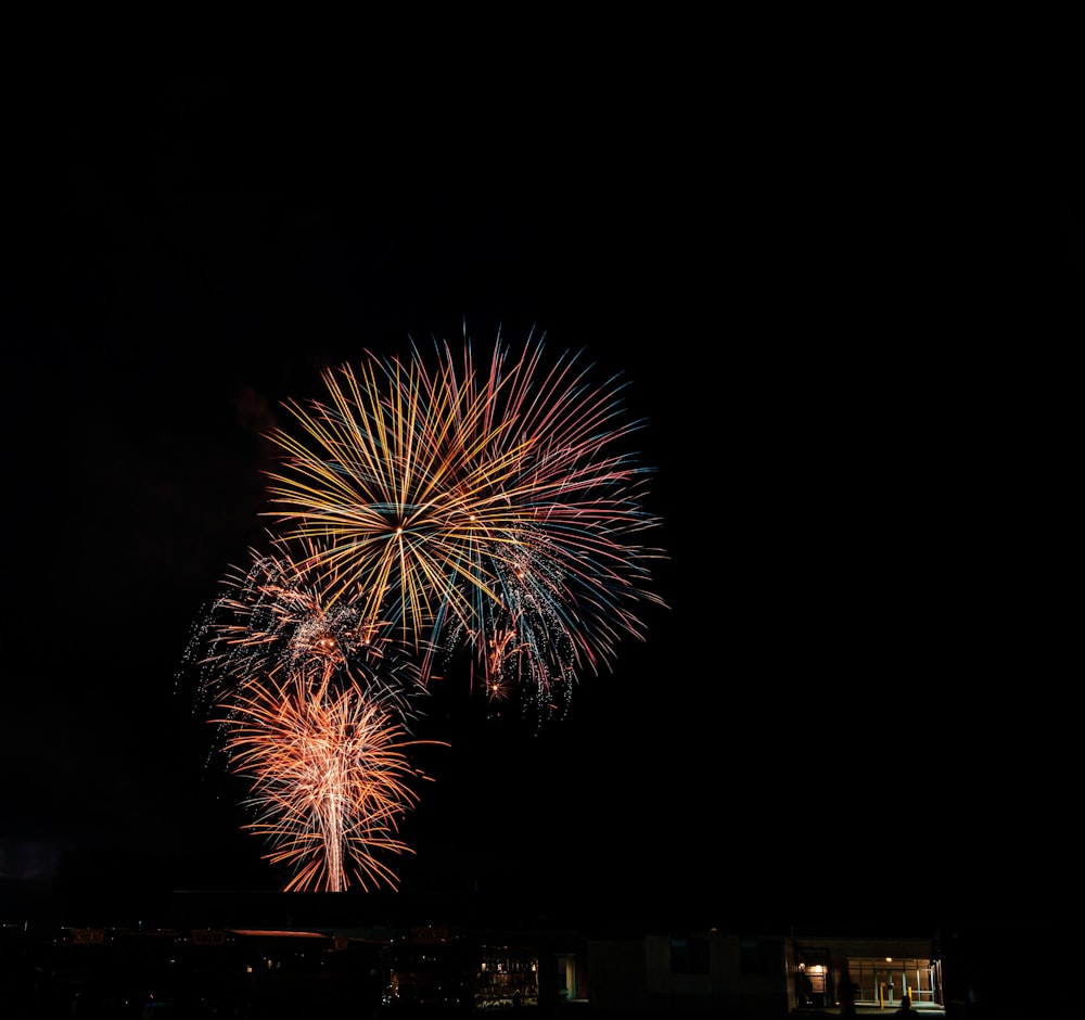 a large fireworks display in the dark sky