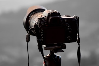 a close up of a camera on a tripod