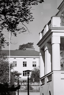 a black and white photo of a clock tower