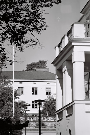 a black and white photo of a clock tower