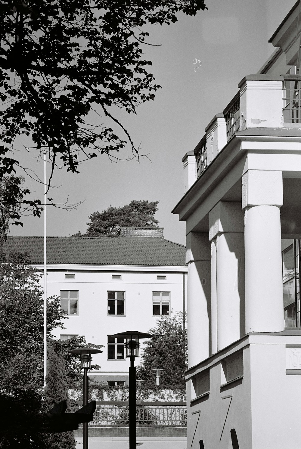 a black and white photo of a clock tower