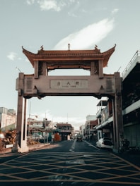 a street with a gate and a sky background